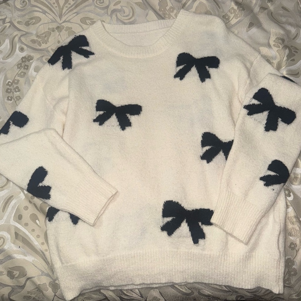 Women's Cream Sweater with Black Bow Accents